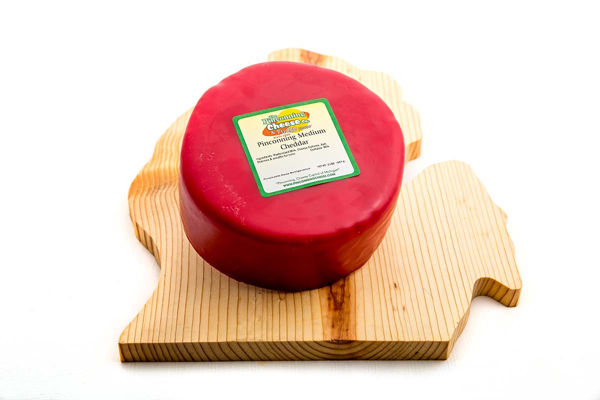 1 lb. Pinconning Medium Cheddar with Red Wax Casing - Pinconning